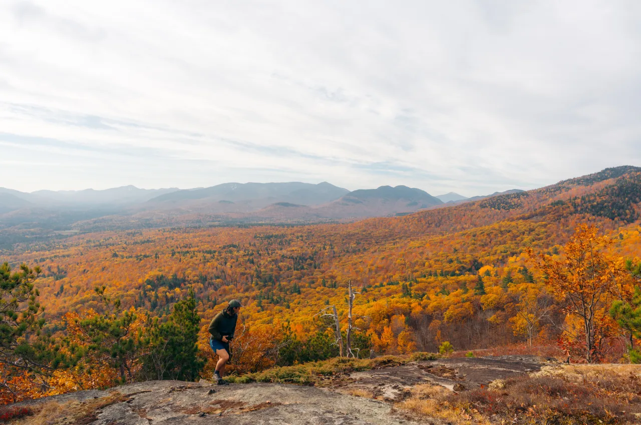 A hiker on The Cobble in the fall
