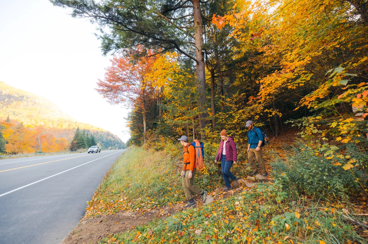 A family hiking in the fall.