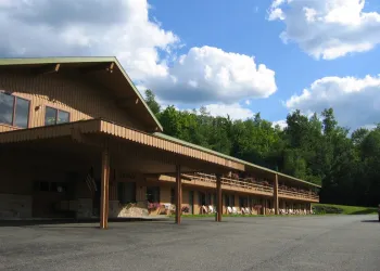 Exterior of Ledge Rock at Whiteface showing the large paved driveway