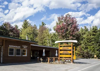 The exterior of Up a Creek with brown siding