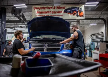 Students work on cars
