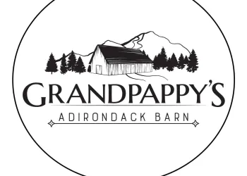 A white backdrop with black lettering and an illustration of a barn with tall trees and a mountain.