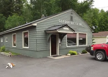 A green building labeled Gordon Oil Co Inc