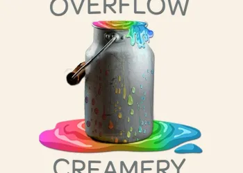 A milk canister overflowing with rainbow colored liquid