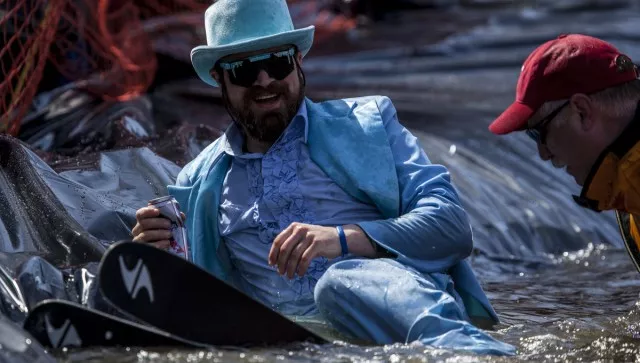 Not everyone can look this dapper after plunging into the pond skimming pool.