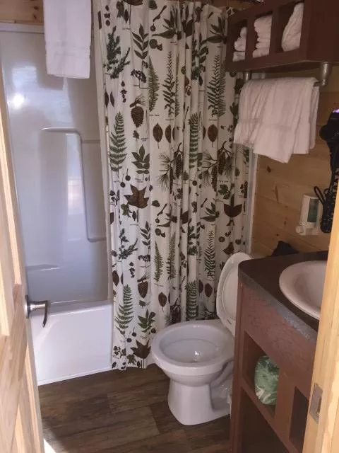 The cabin comes complete with a private bath. You win!
