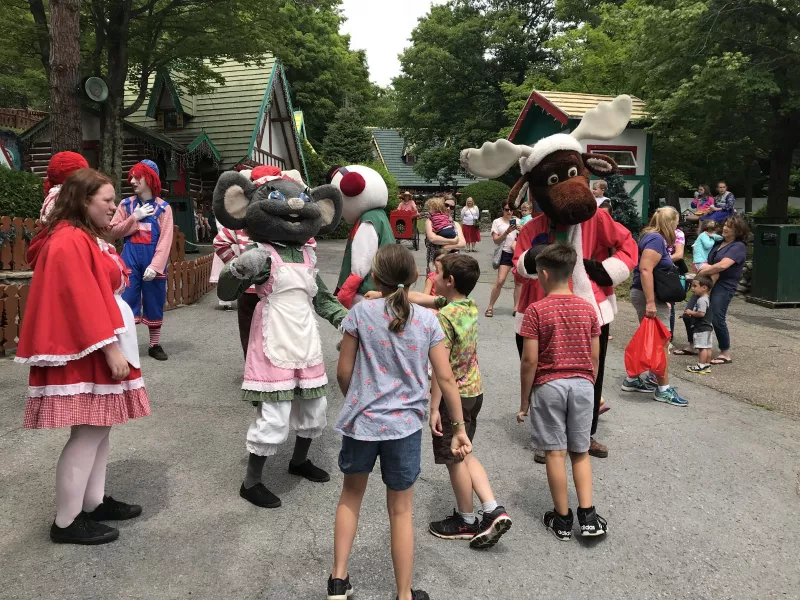The parade of characters saunters through the village, in preparation for Santa's big arrival! The excitement builds — can you feel it?