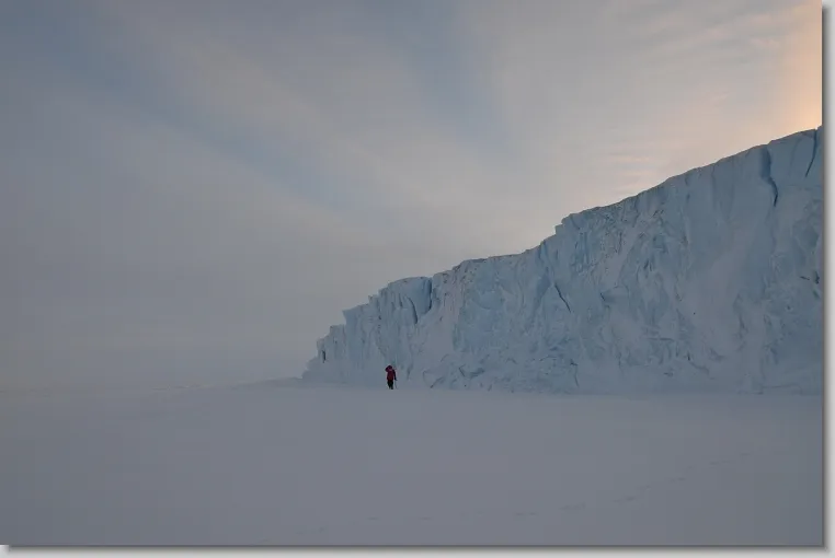 A landscape photo of a single human in Antarctica. Photo courtesy Richard Brandt.