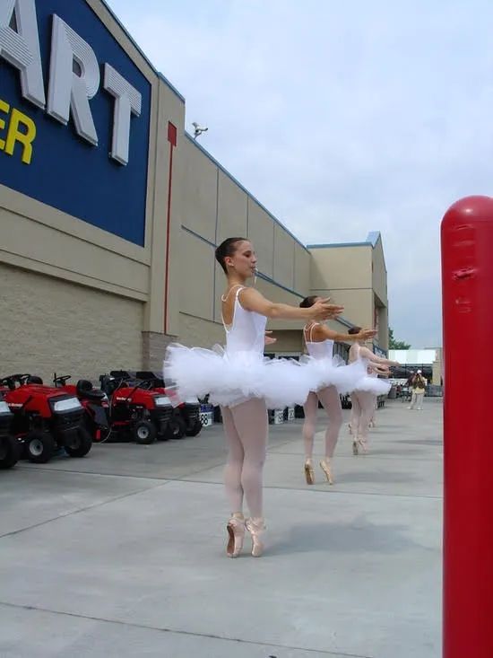 Ballerinas perform in the parking lot of a Walmart. Image courtesy Norman Jabaut and Jason Andrew.