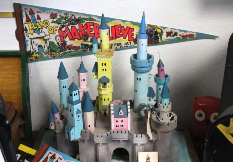 A brightly colored model of a fairy tale castle.
