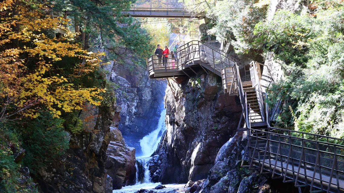 Waterfalls surrounded by observation decks and trees with fall leaves
